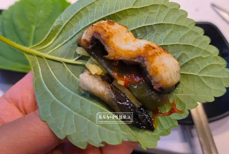 Close-up of eel grilling