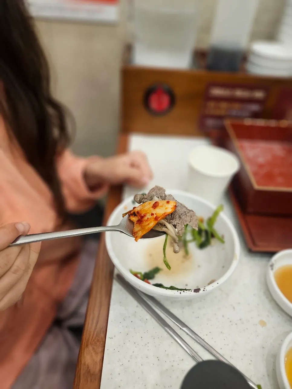 Minari wrap topped with Uiseong garlic kimchi