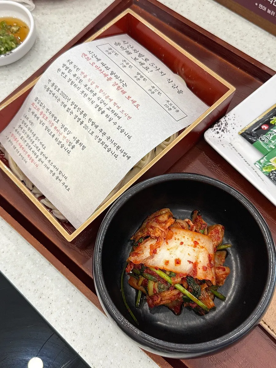 A full spread of chadol minari-ssam and shabu-shabu meat