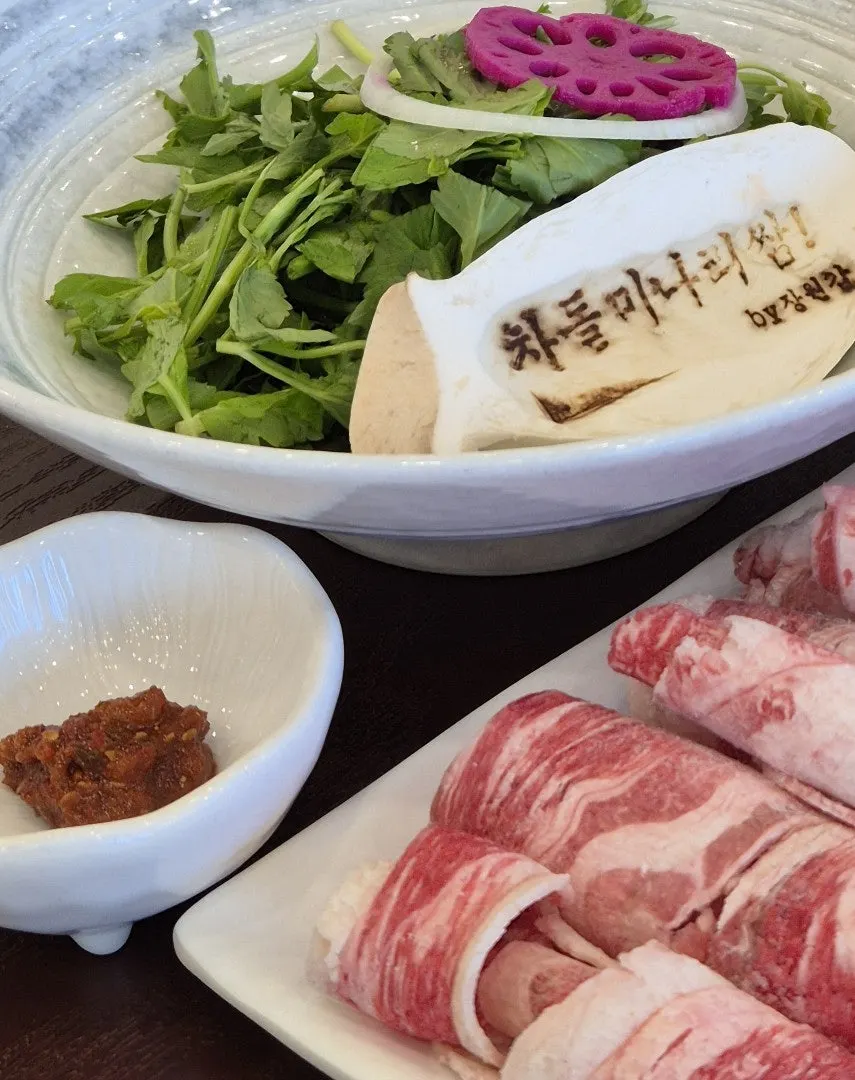 Brisket minari wrap topped with galchi-sokjeot