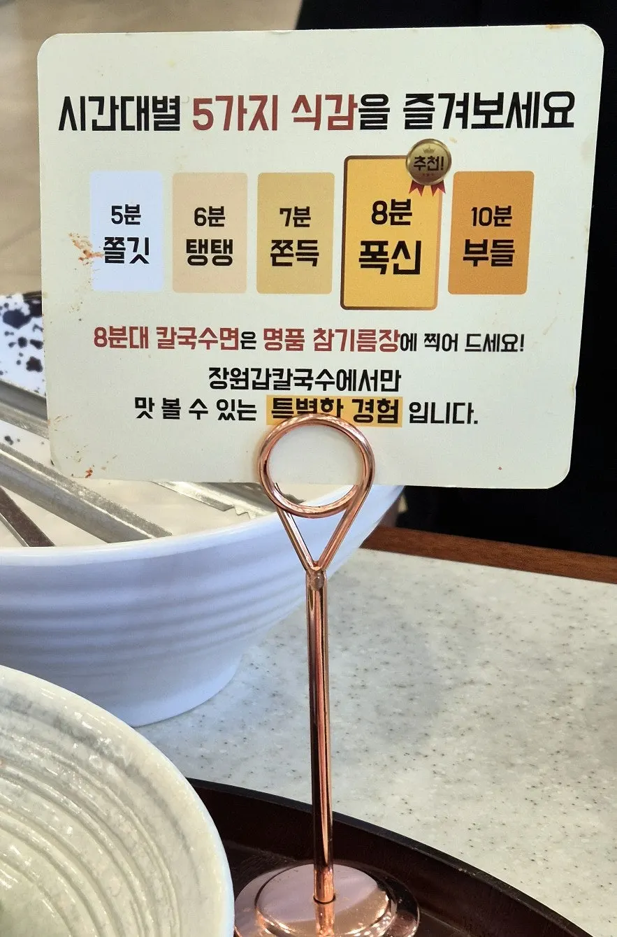 Pouring fresh noodles into the pot