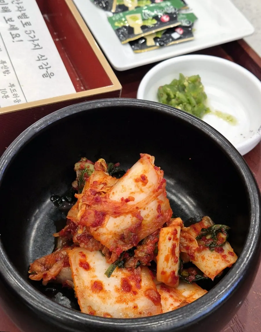 Kalguksu noodles dipped in sesame oil sauce