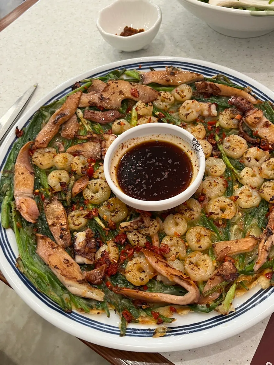 Seafood pancake loaded with toppings