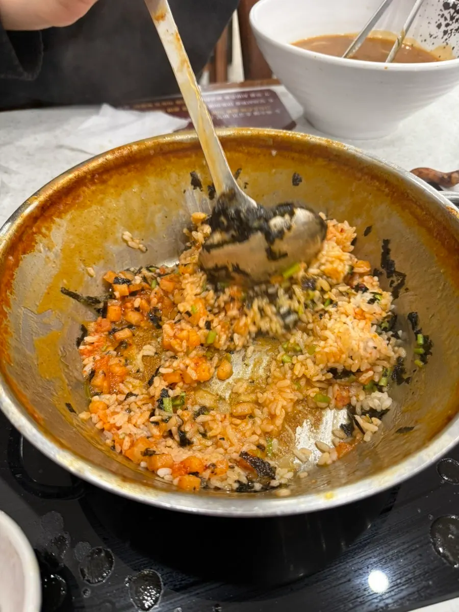 Cooking the perilla oil kkakdugi fried rice