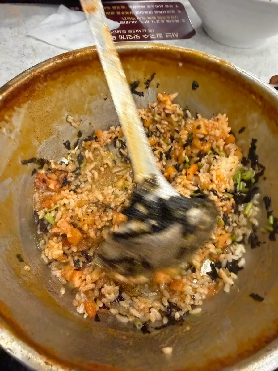 Perilla oil fried rice topped with gim flakes