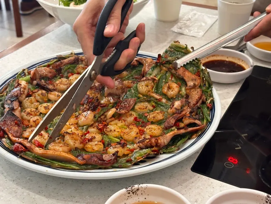 Crisply fried seafood pancake with whole shrimp