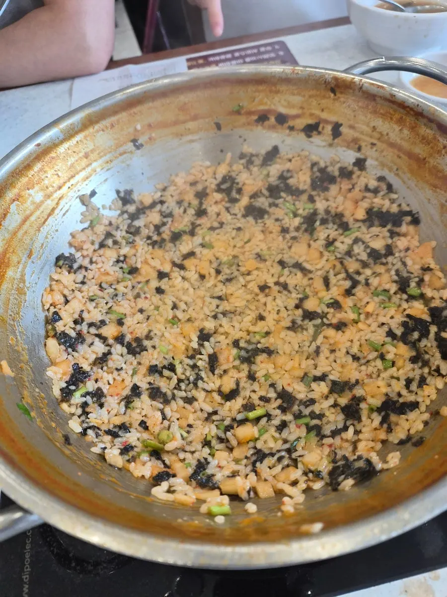 Free perilla-oil kkakdugi fried rice served at the table