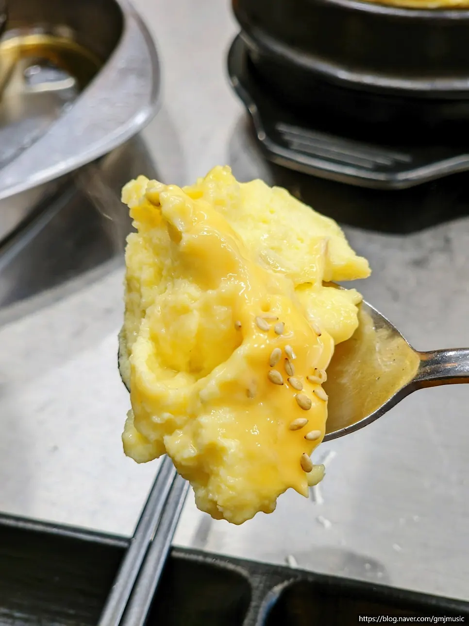 Cheese-bomb steamed egg topped with cheese