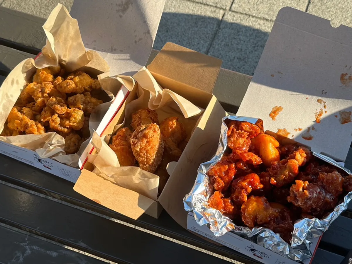 Three chicken menu items packed for the Han River