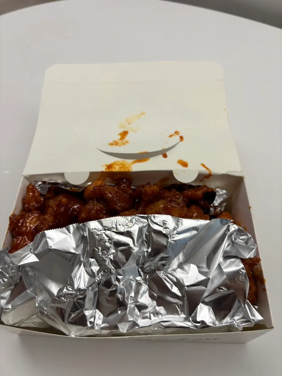 Dakgangjeong packaged with toothpicks included