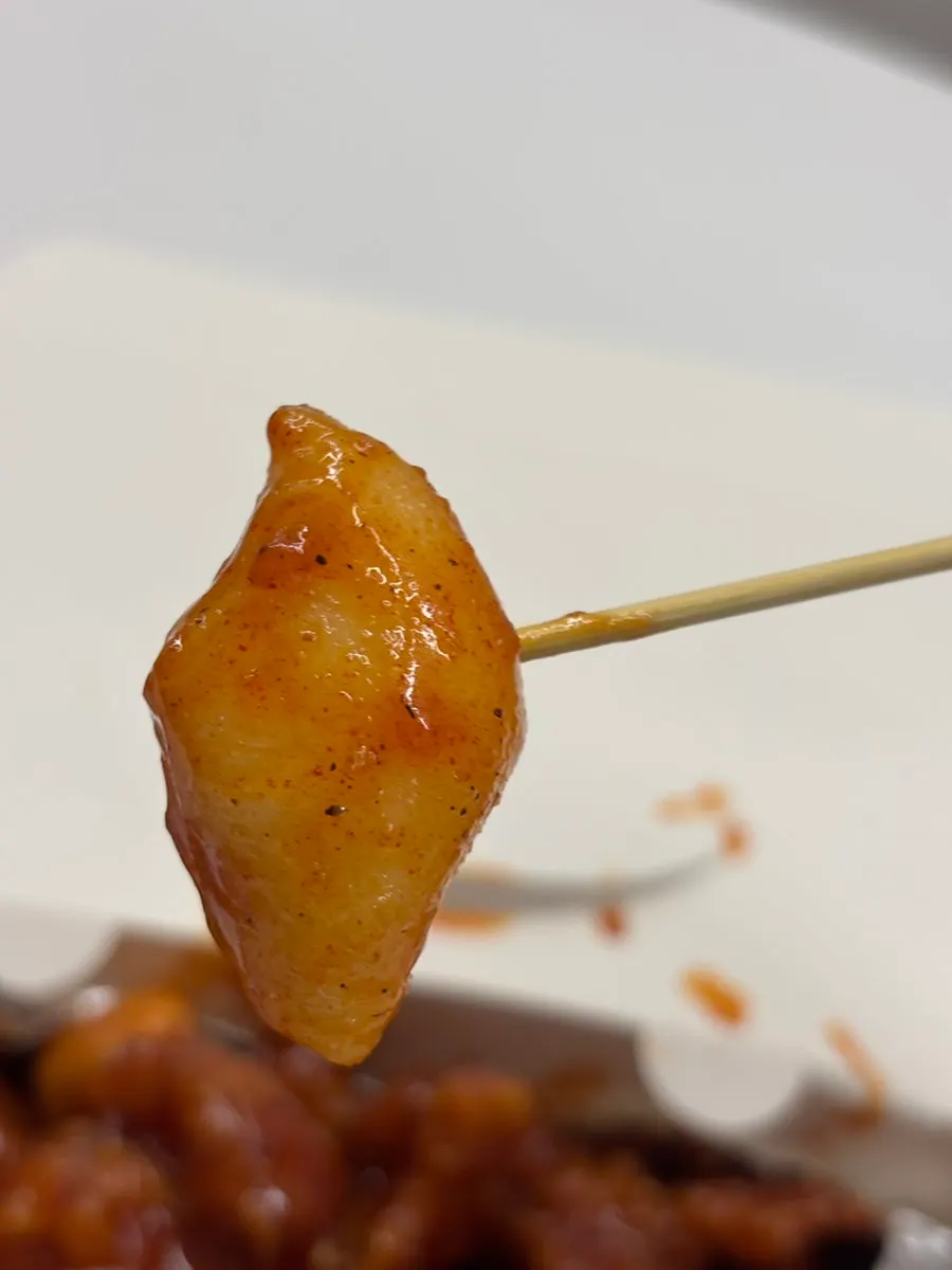 Close-up of bite-sized boneless dakgangjeong