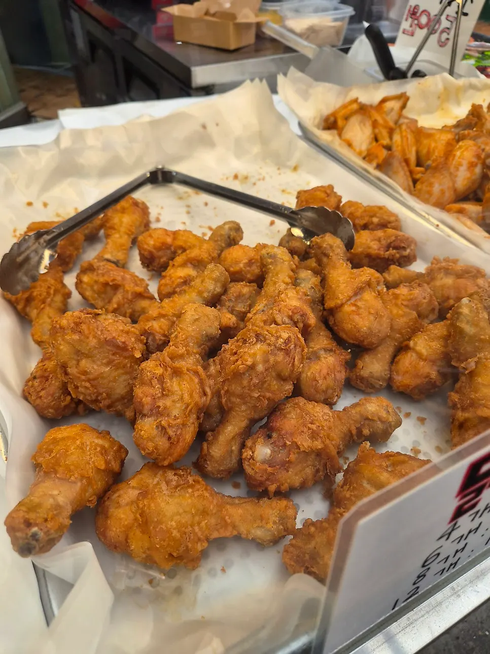 Seasoned chicken packed in a takeout box