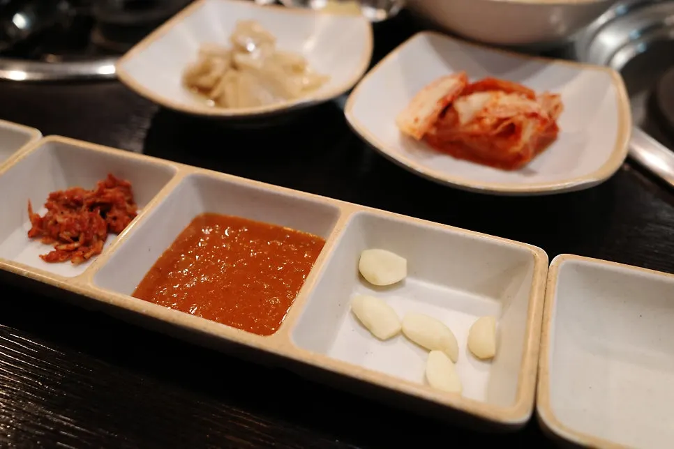 Two sauces: garlic saeujeot and plain saeujeot