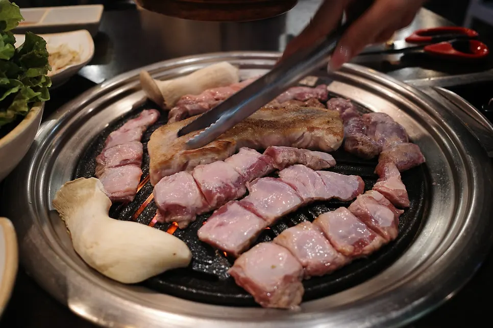 Whole skirt steak grilling, trimmed of connective tissue