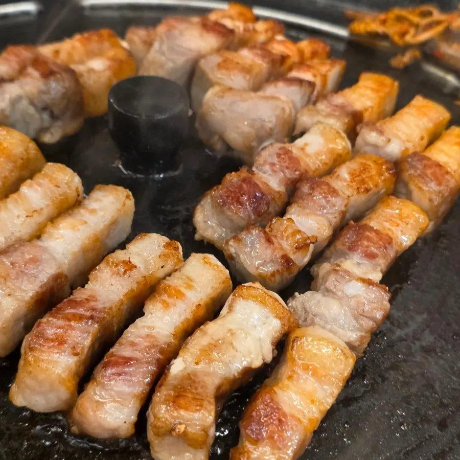 Bracken grilled in pork fat