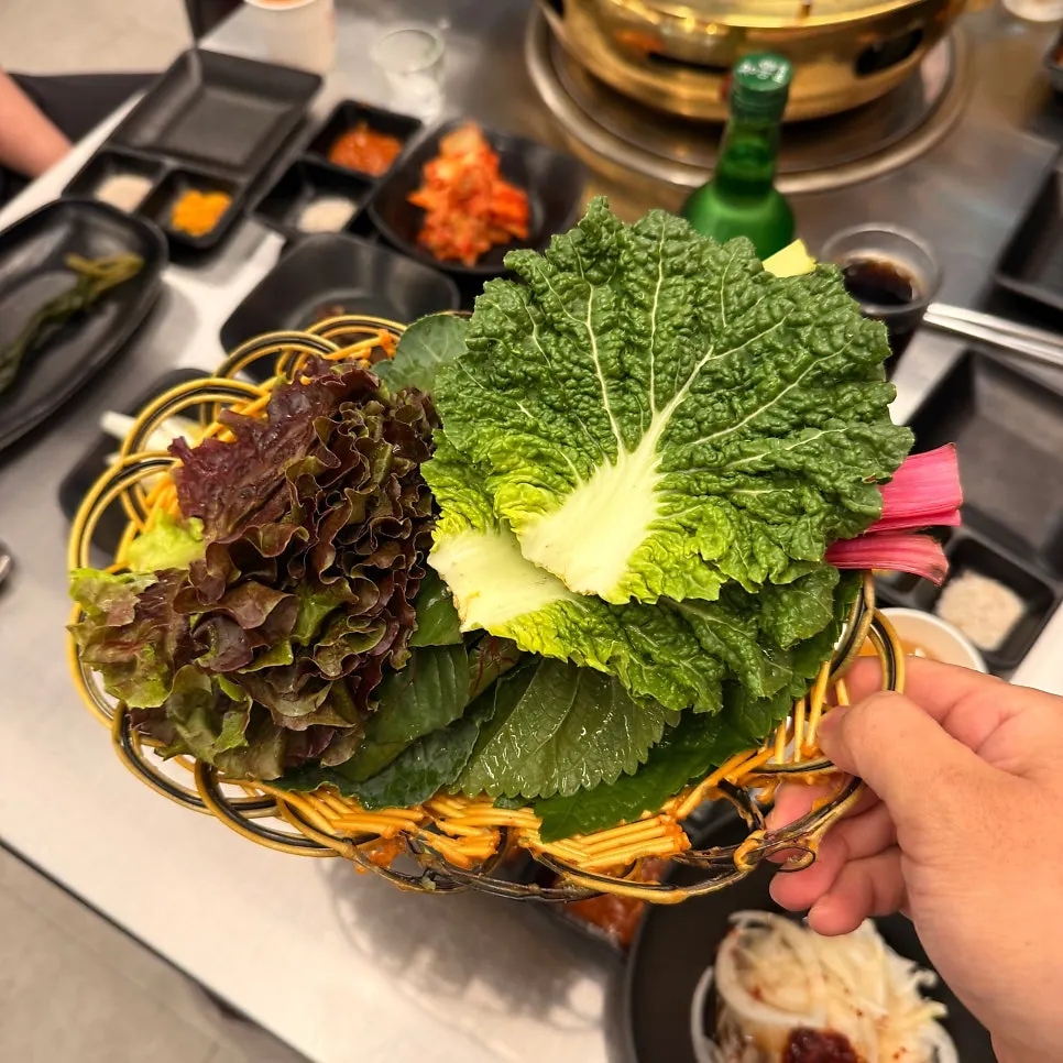 Variety of wrap greens stacked at the self-serve bar
