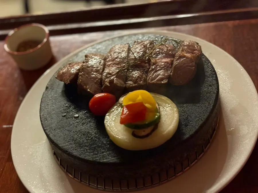 A piece of stone steak browned nicely on the outside