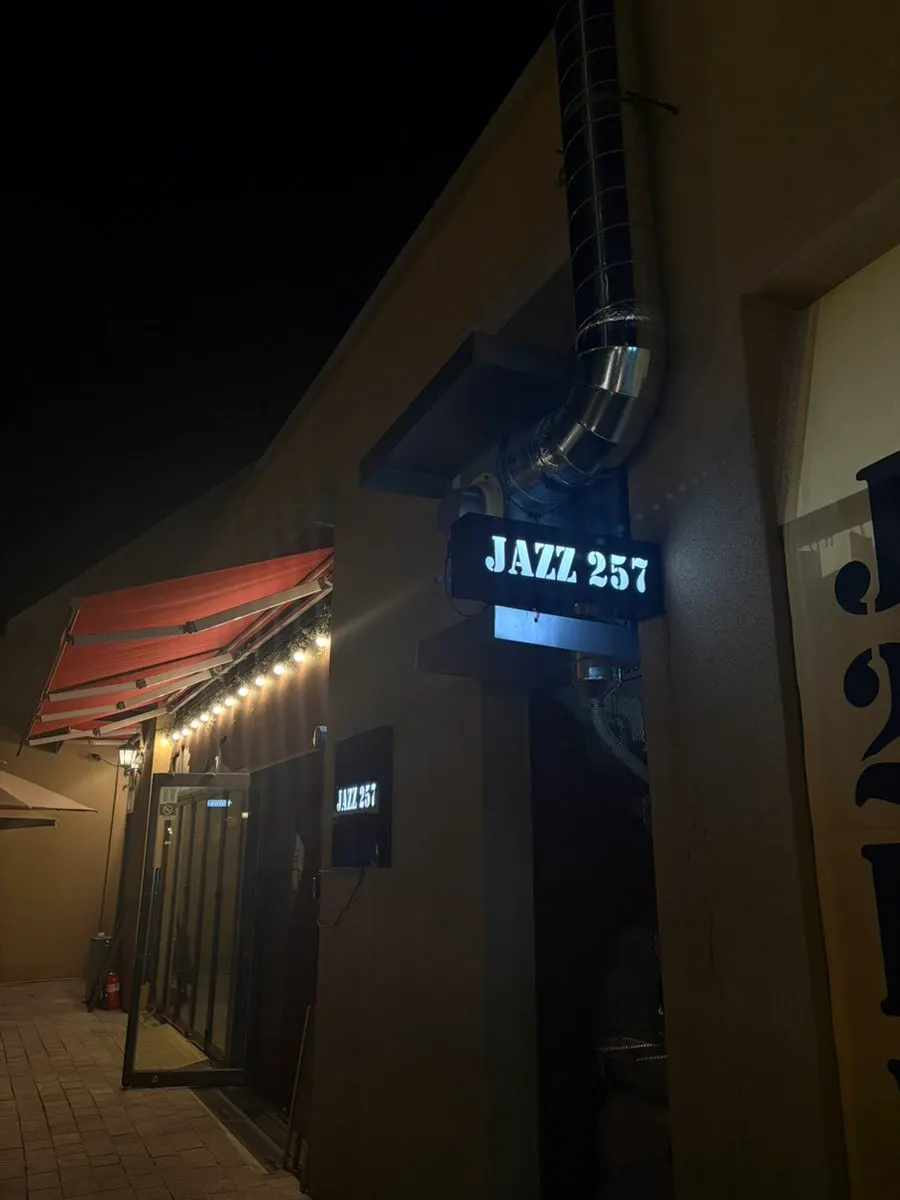 Live jazz performance at Jazz 257 with the Central Park night view