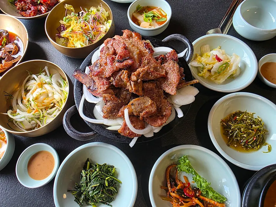 Deojinji pork galbi with a full spread of basic side dishes