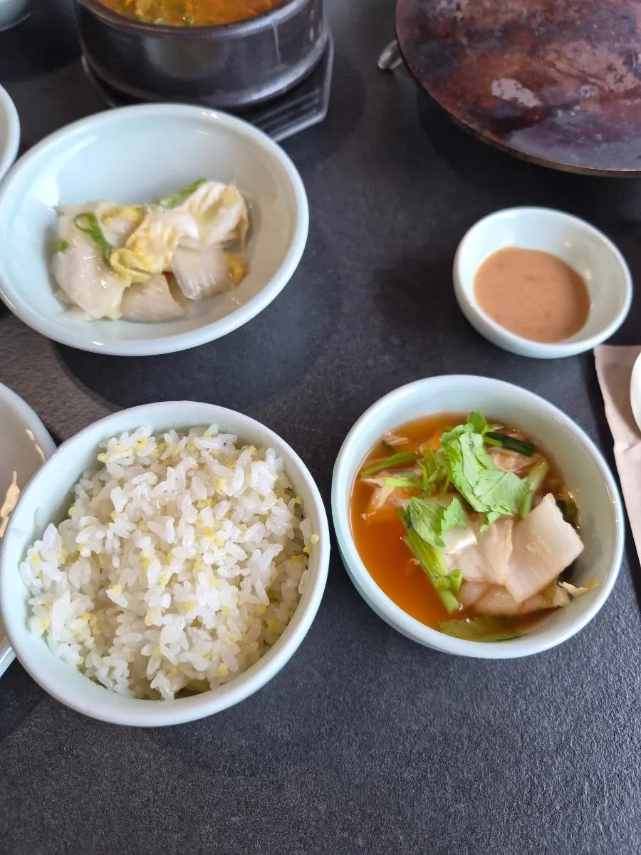 Meal with millet rice and onion salad
