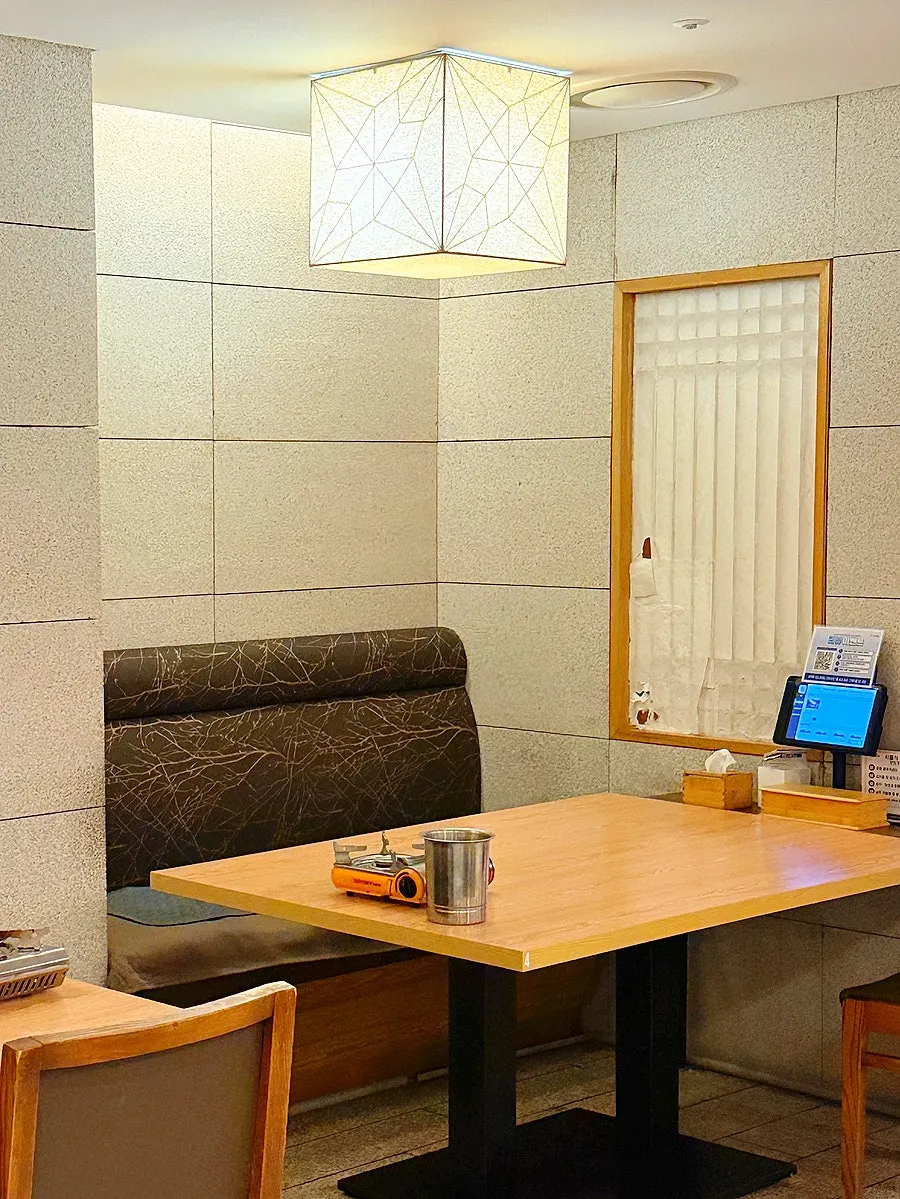 Tables and neat interior atmosphere at Deulbabae