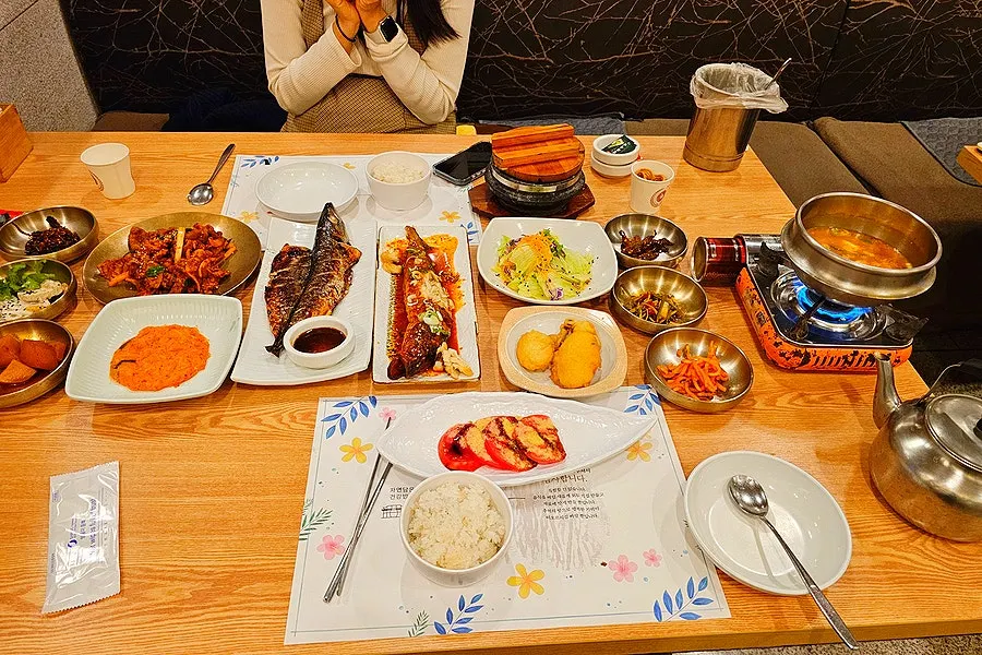 Table filled with Korean set-meal banchan