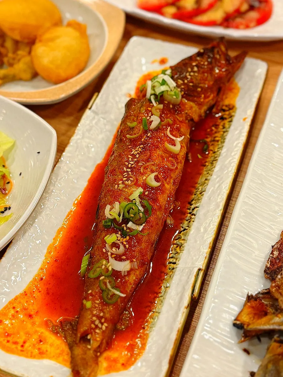 Close-up of the plump braised codfish