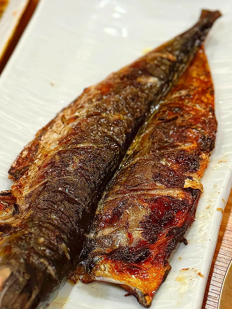 Whole grilled mackerel cooked golden brown