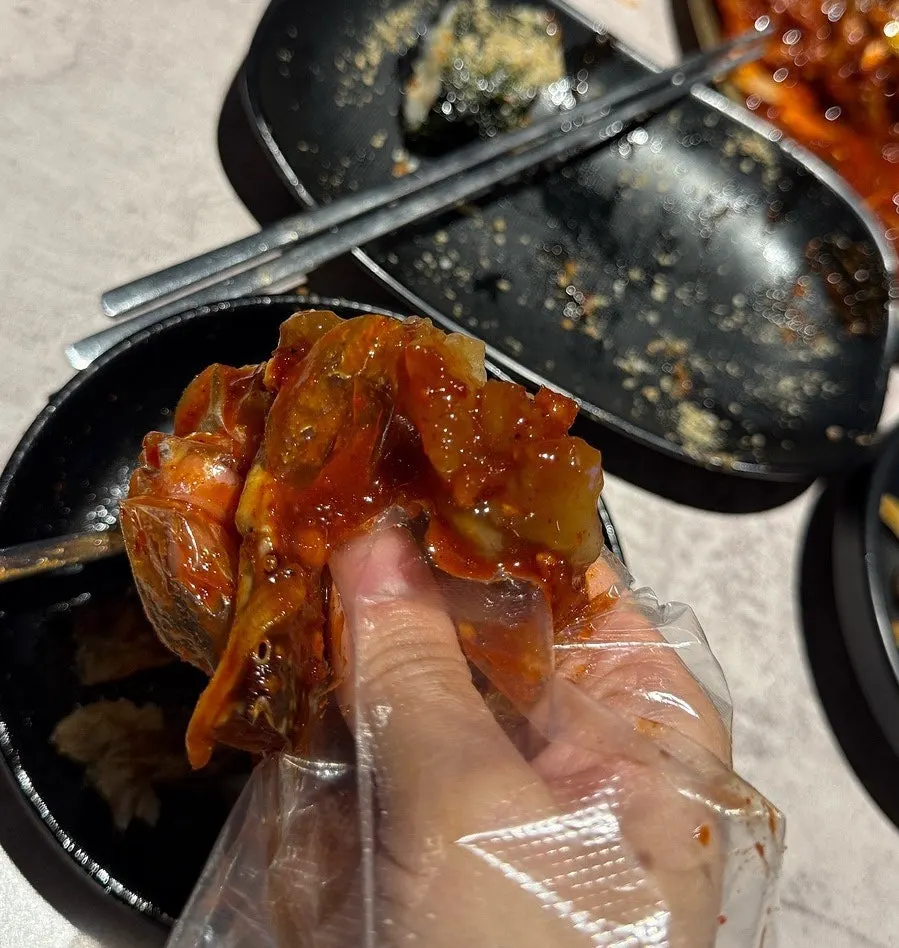 Close-up of the spicy marinated crab packed with meat