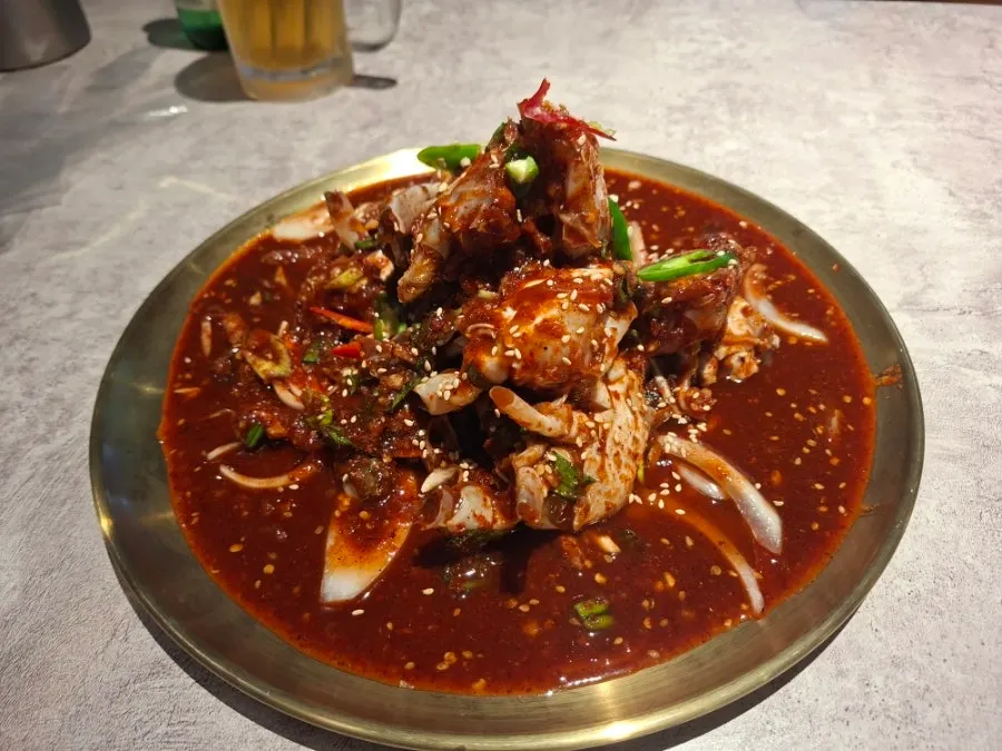 Marinated crab with a light, saucy seasoning