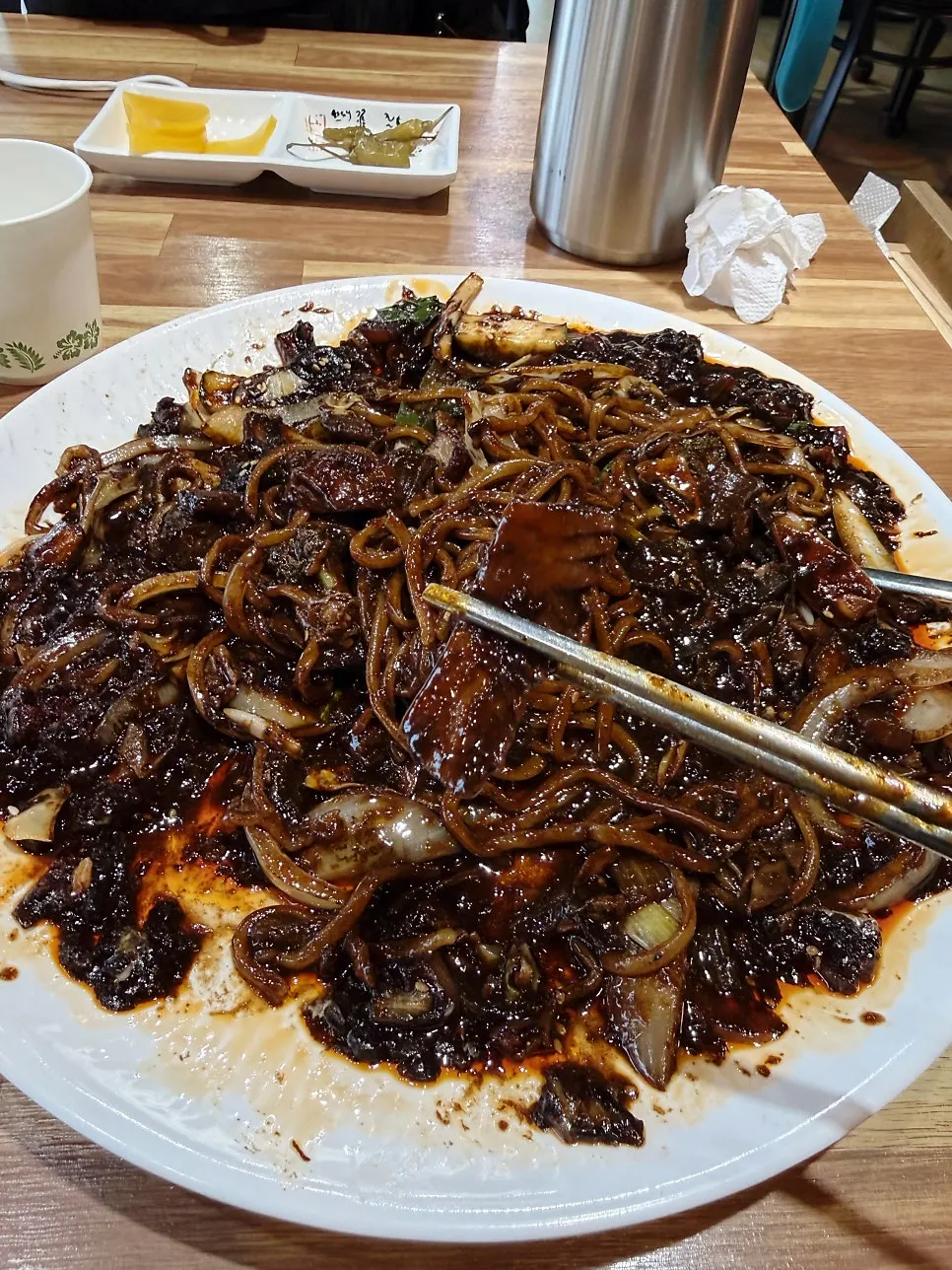 Meat and vegetable toppings inside the tray jjajang