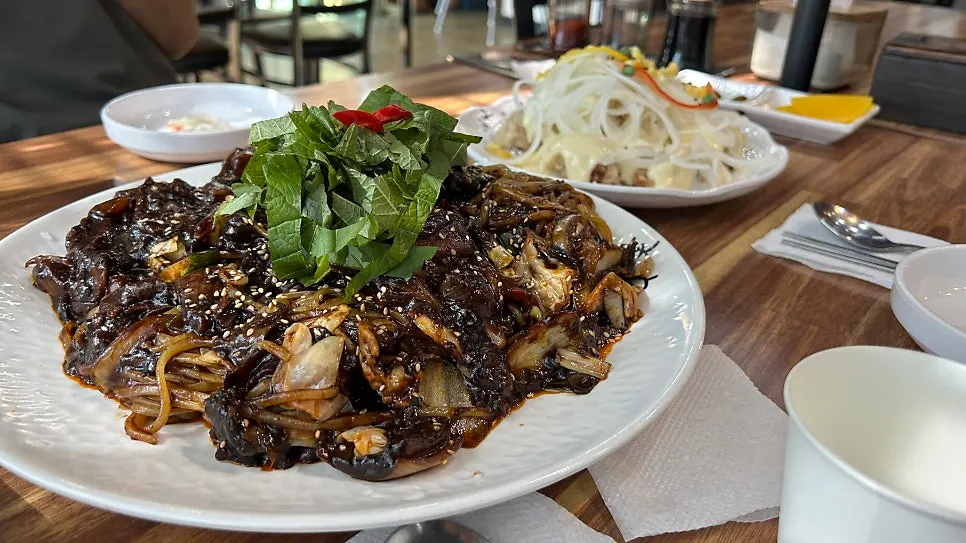 Tangsuyuk piled high with cream sauce