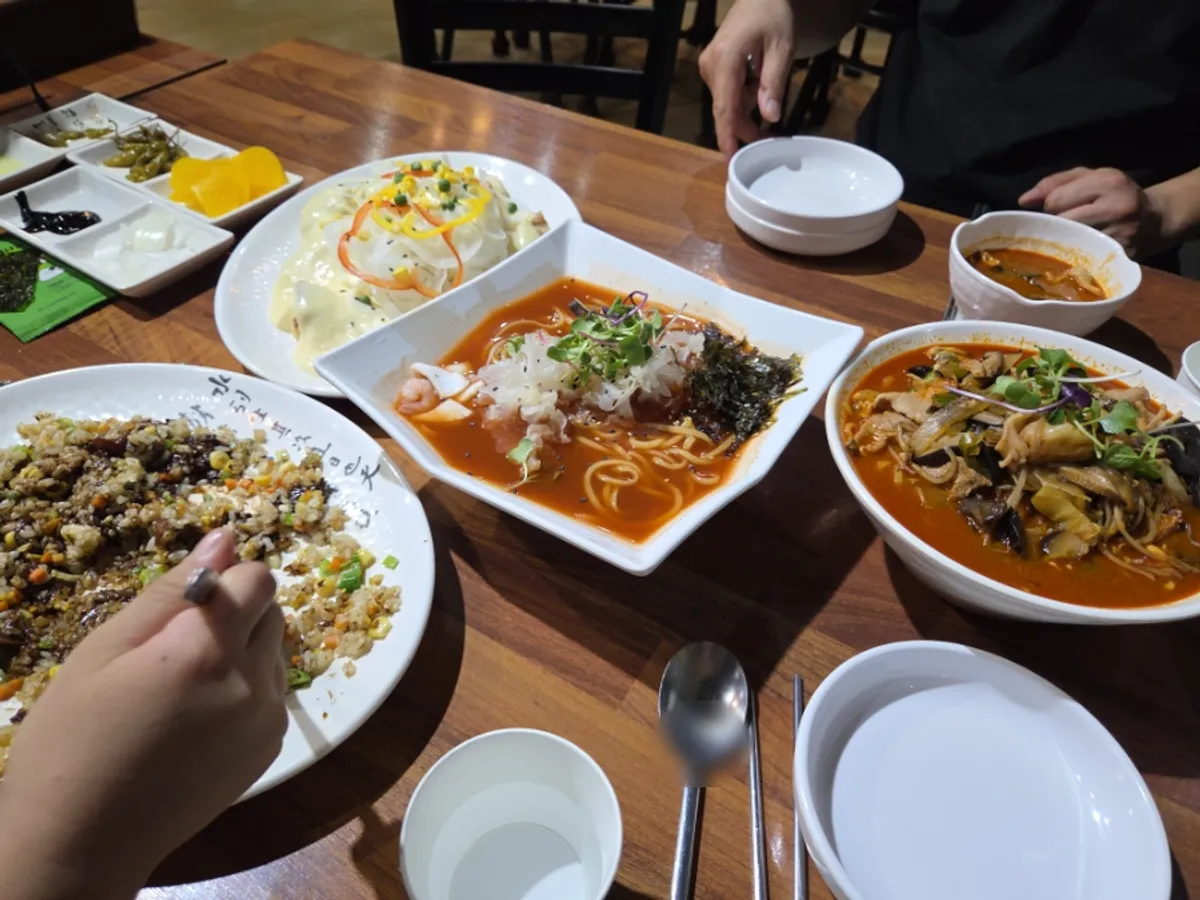 A child's hand reaching for the cream tangsuyuk