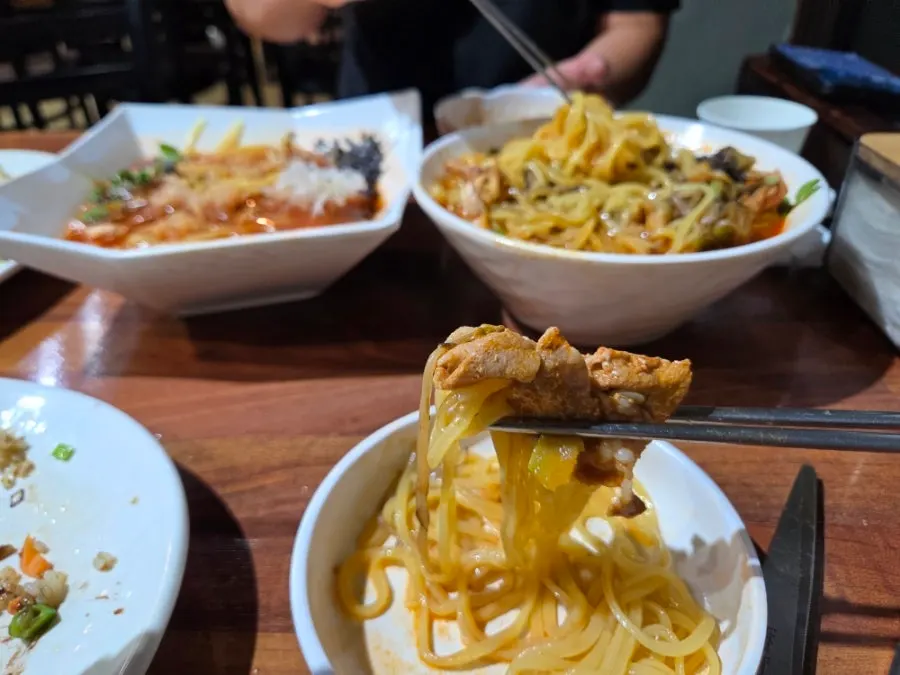 A bowl of jjamppong with rich broth