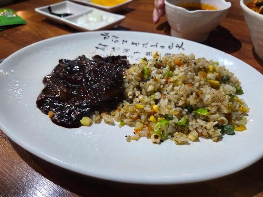 Fried rice stir-fried with jjajang sauce and egg