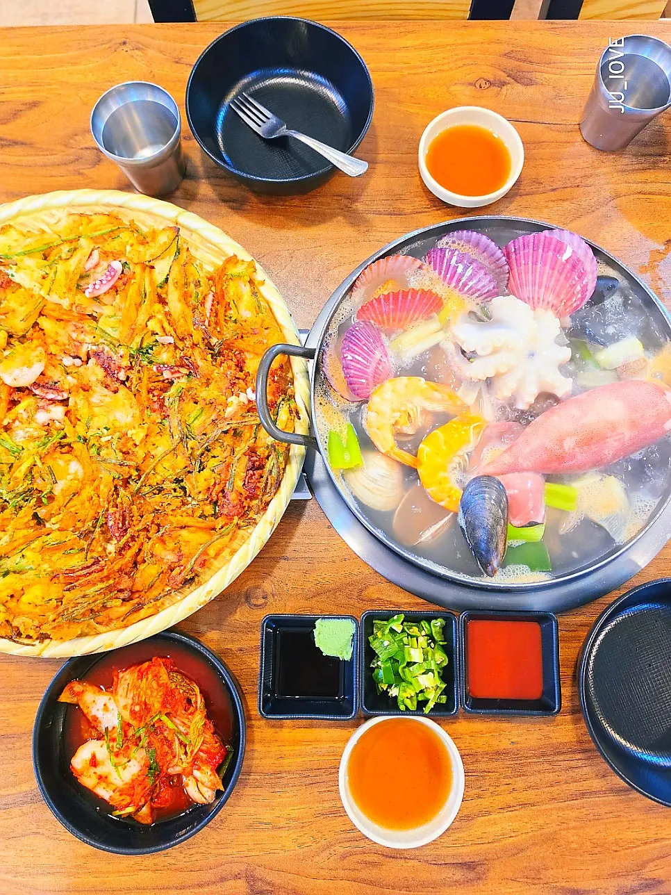 Seafood pot with squid, octopus, and shrimp on top