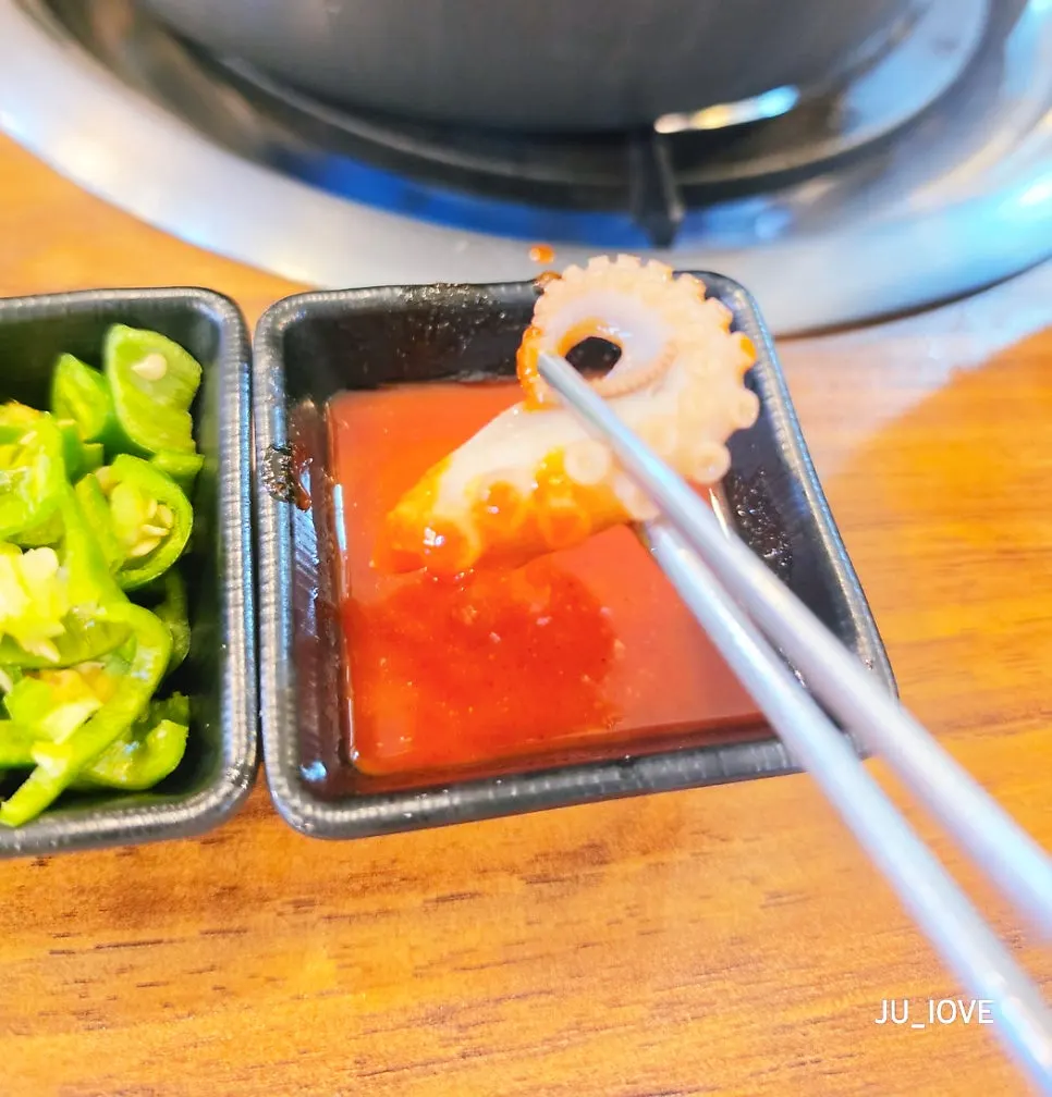 Pot of seafood cut with scissors