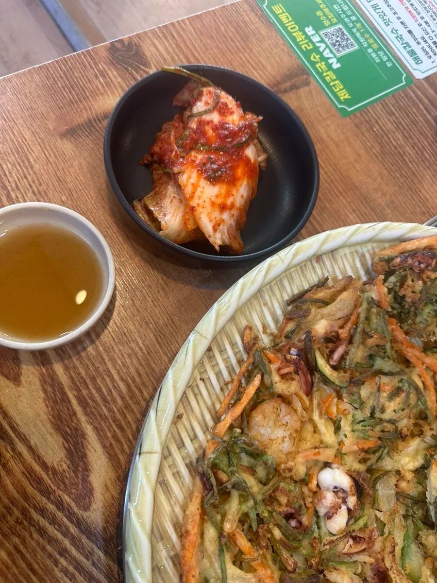 Self-serve station with extra kimchi and pickled radish