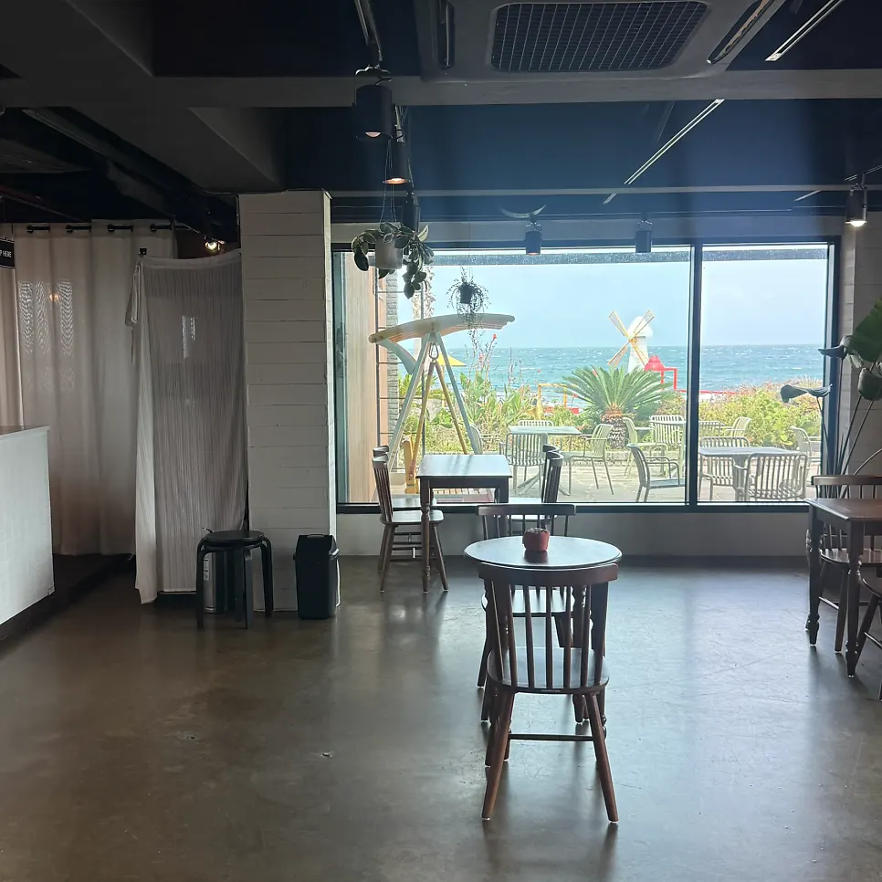 Aewolbon Café interior with wood elements and beige-toned walls