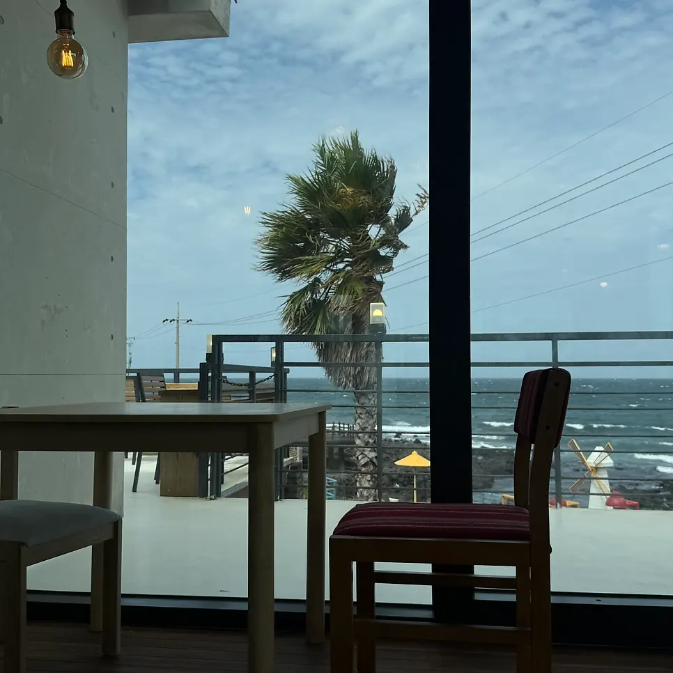 Interior space of Aewolbon Café with large windows