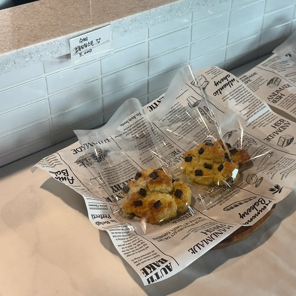 A chocolate chip scone served on a plate