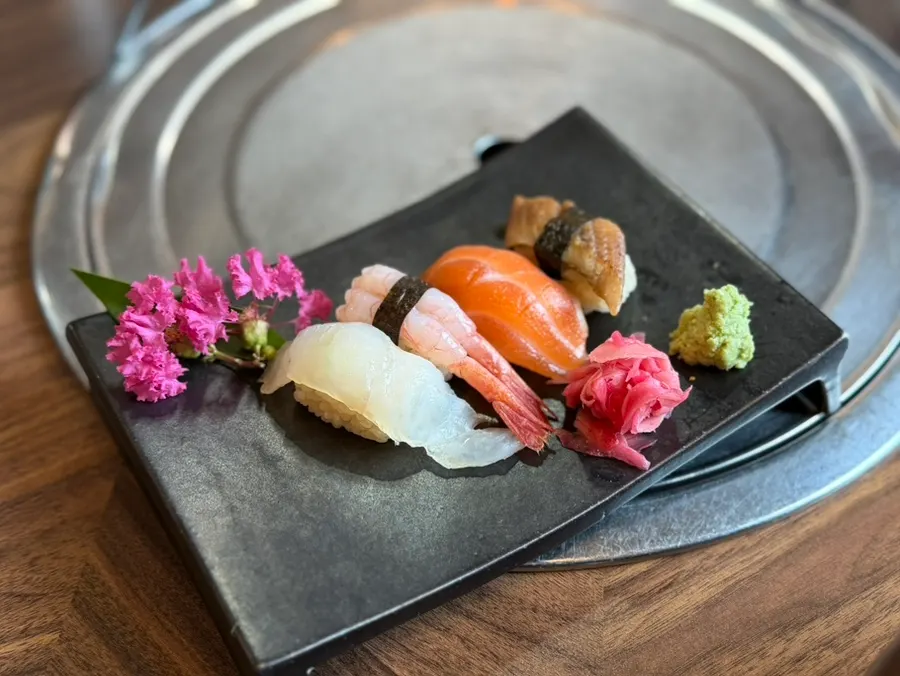 Full table setup of jar seafood ramyeon with a set of 4 sushi pieces