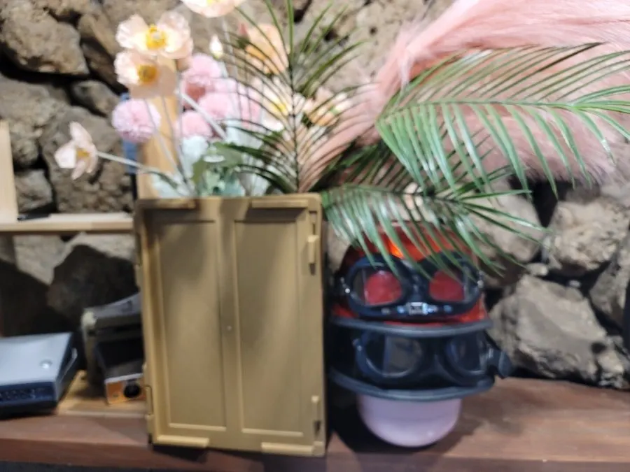 Photo props arranged neatly in front of the stone wall