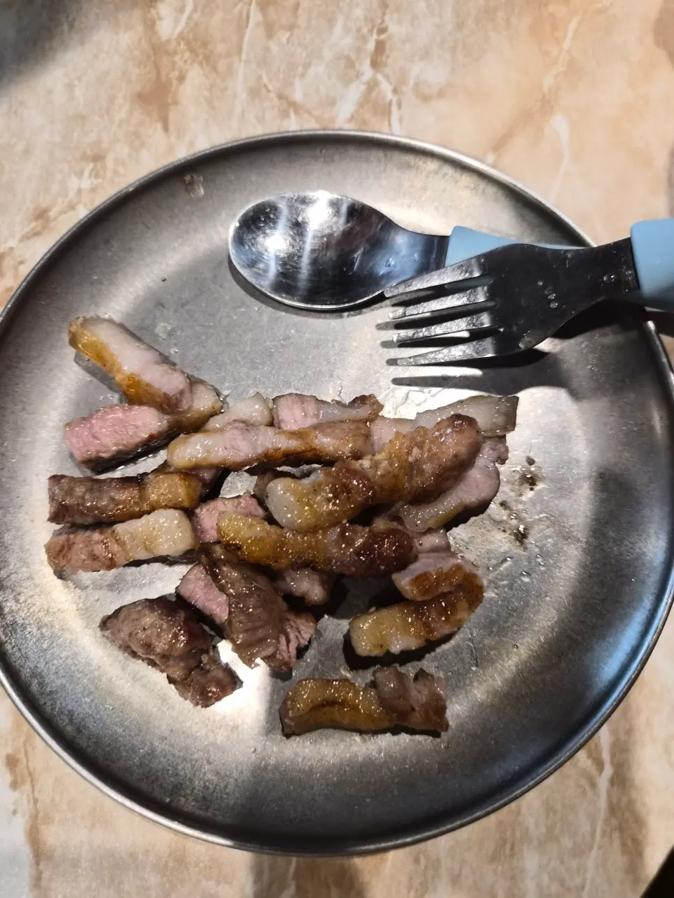 Black pork cut into bite-sized pieces for kids