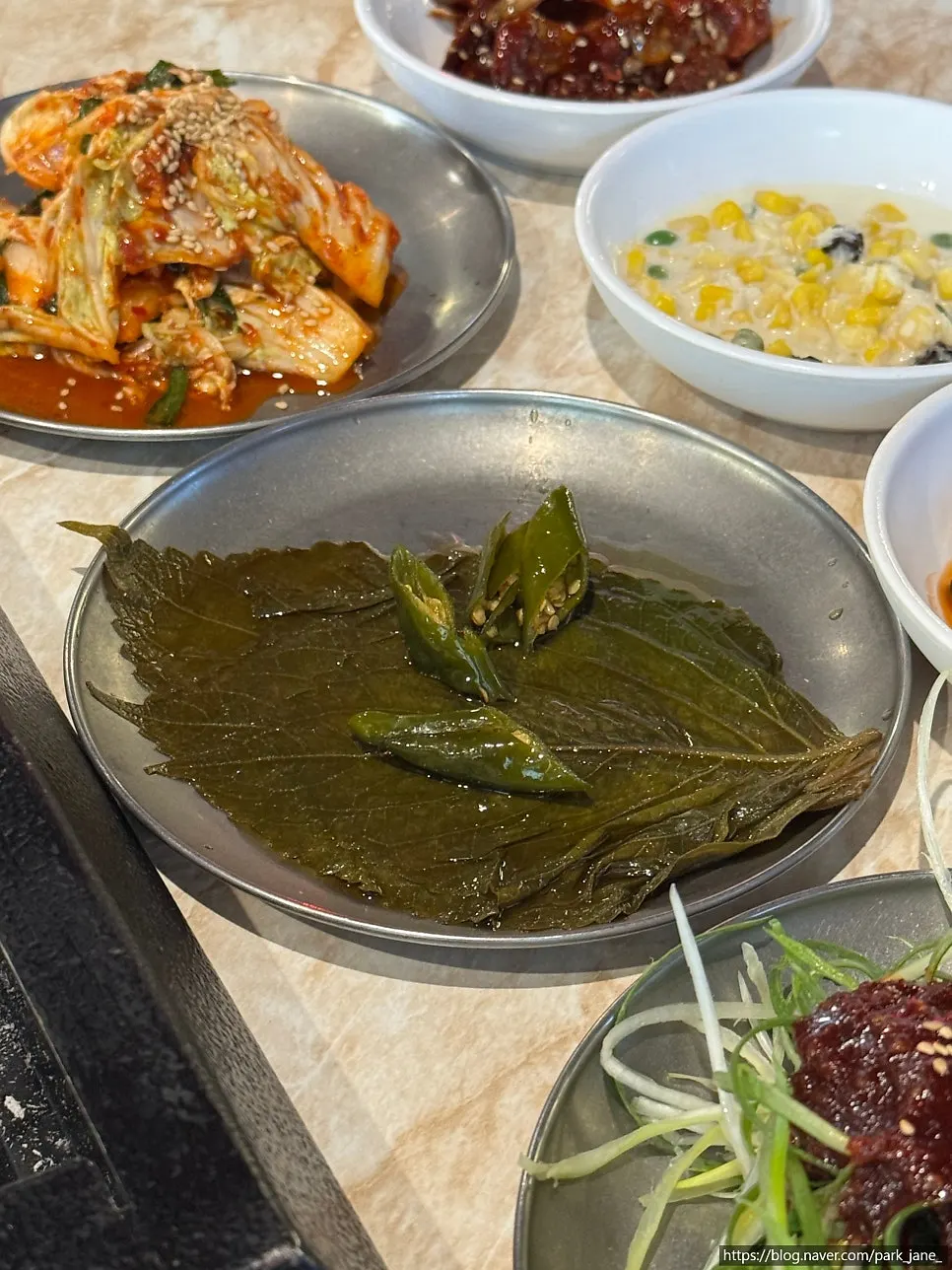 Black pork on the grill with side dishes
