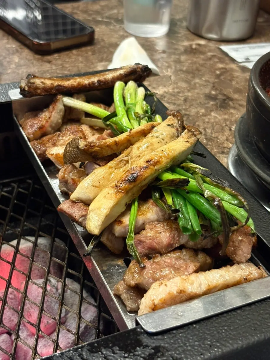 Black pork grilling with smoky charcoal flavor