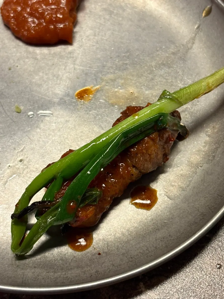 Grilled raw ribs plated piece by piece