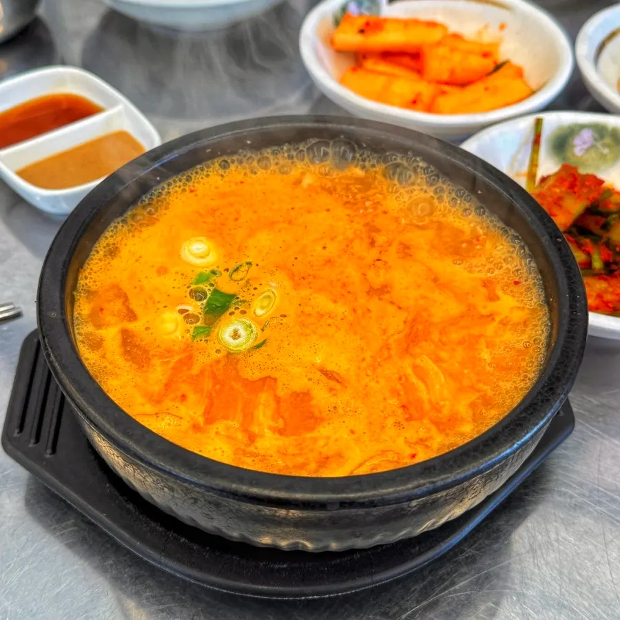 Cheonggukjang stew bubbling in a stone pot