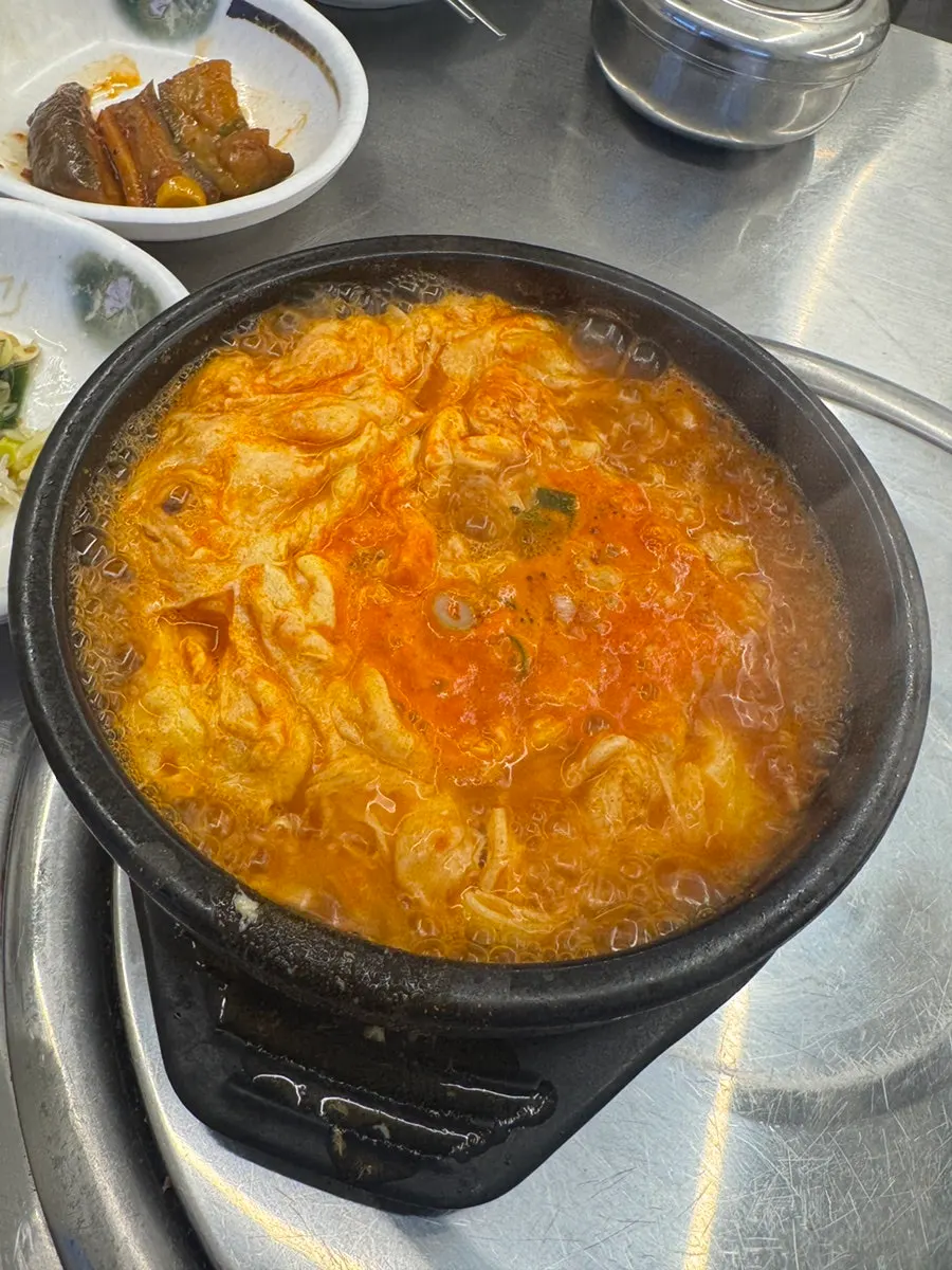 Sundubu-jjigae served in a stone pot