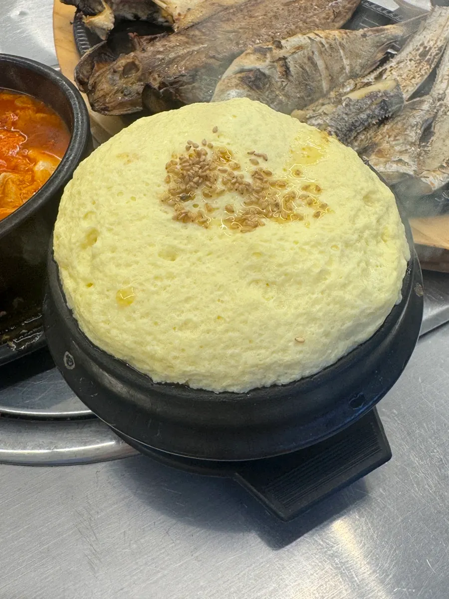 Sundubu-jjigae arriving still bubbling